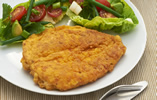 Parmesan, paprika and cornmeal chicken escalopes with French bean, avocado and cherry tomato salad