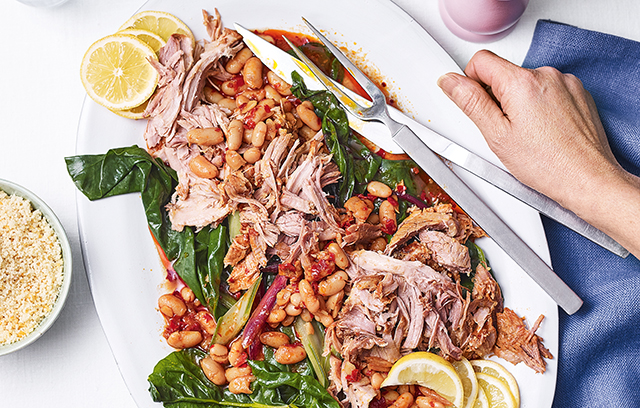 Harissa-rubbed pork shoulder with white beans and chard