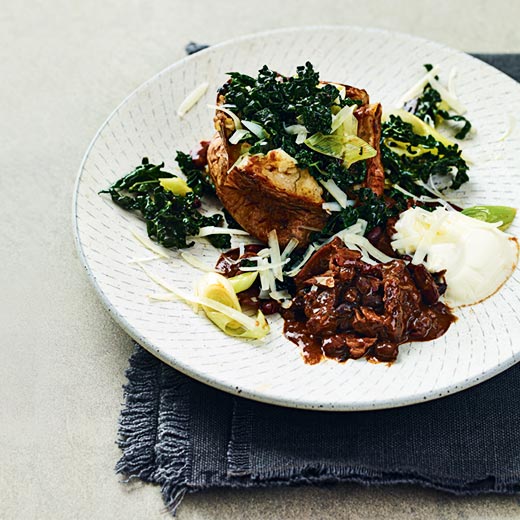 Slow-Cooked Beef Brisket Chilli with Cavolo Nero and Baked Potatoes
