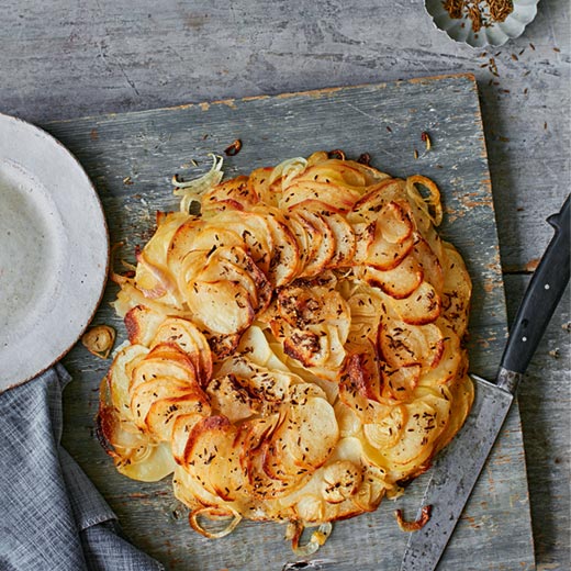 Layered Potato Galette with Caraway Seeds & Buttered Shallots
