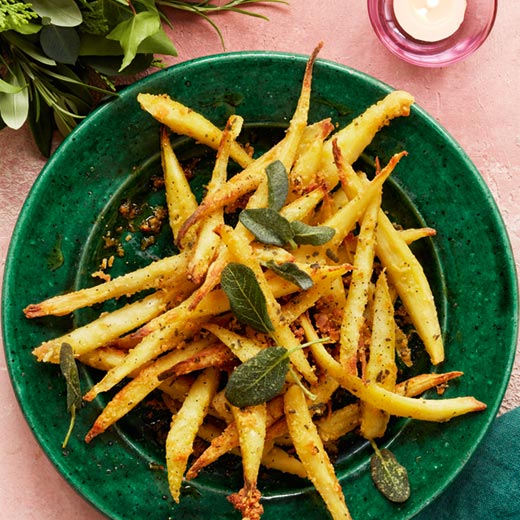 Parsnips coated with parmesan and sage