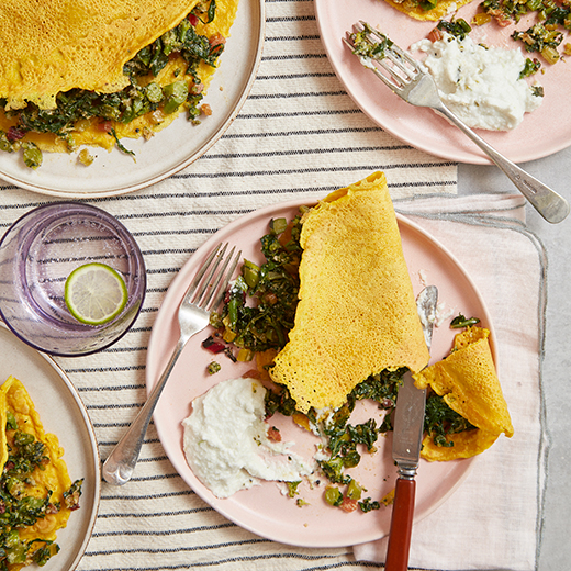 Chickpea flour pancakes with greens and coconut chutney