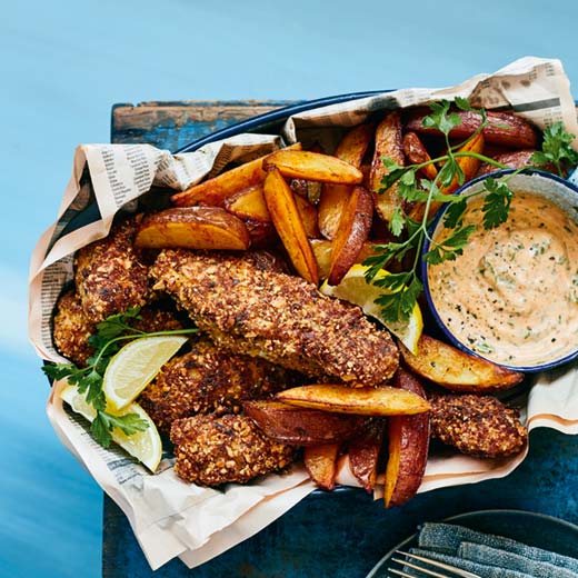Smoked almond-crusted cod with potato wedges