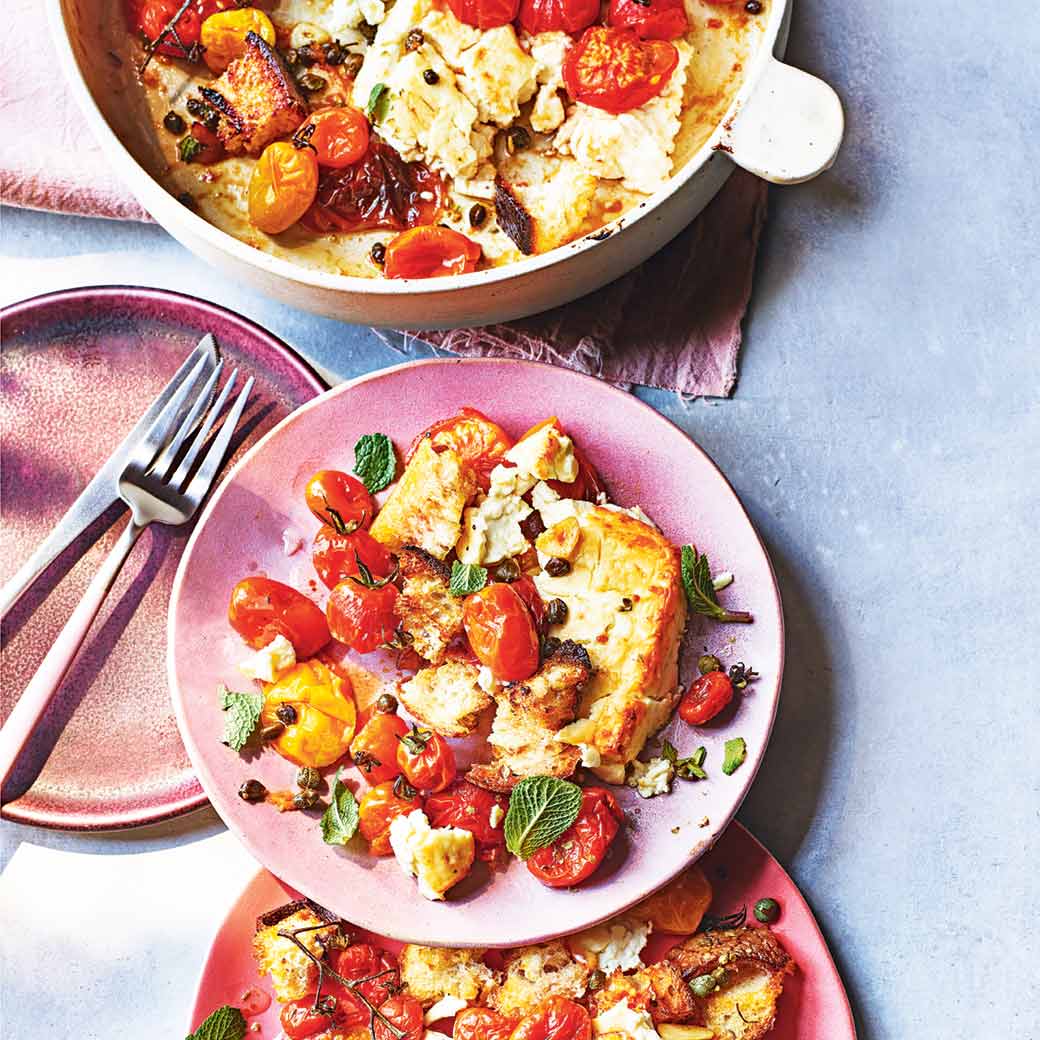 Baked feta and tomatoes with crispy croutons and a caper dressing 