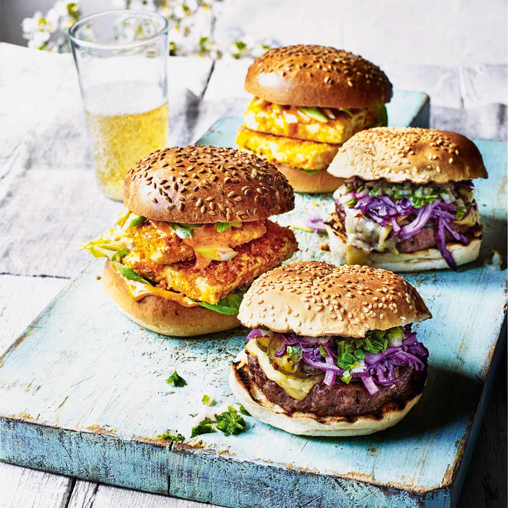 Beef burger with smoked cheese, green chilli salsa, pickles and red cabbage slaw